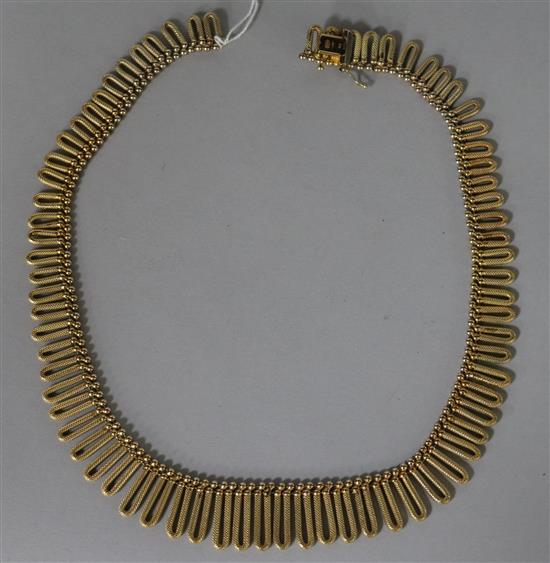 A 9ct gold fringe necklace (clasp detached), 40.5cm.